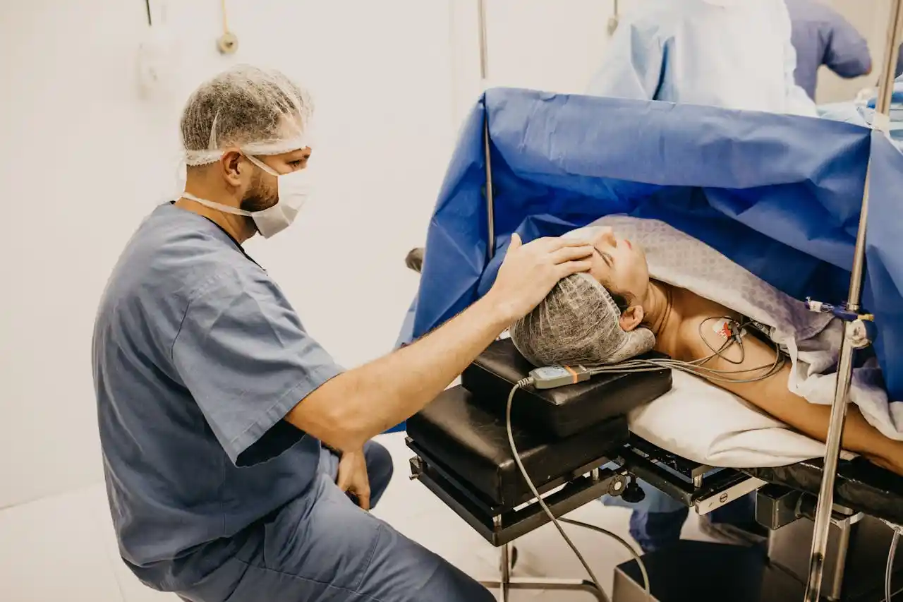 A diverse group of doctors reviewing patient charts in a hospital, showcasing the collaborative environment and various specialties in U.S. healthcare.