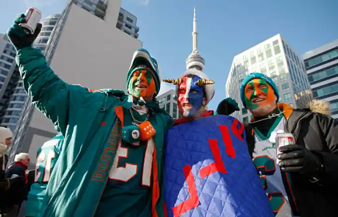 fans in match between miami dolphins vs Buffalo bills