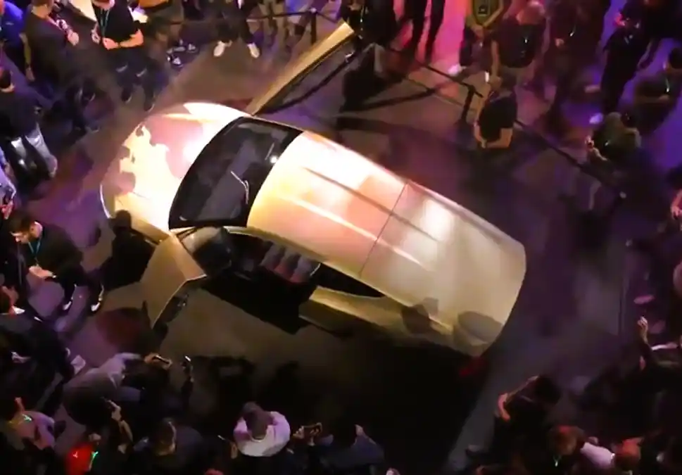 "Tesla introduces the Robovan prototype, designed to carry up to 20 passengers, during the Cybercab robotaxi reveal event."
